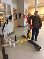 TC Alumni helps build dream catcher at TCES